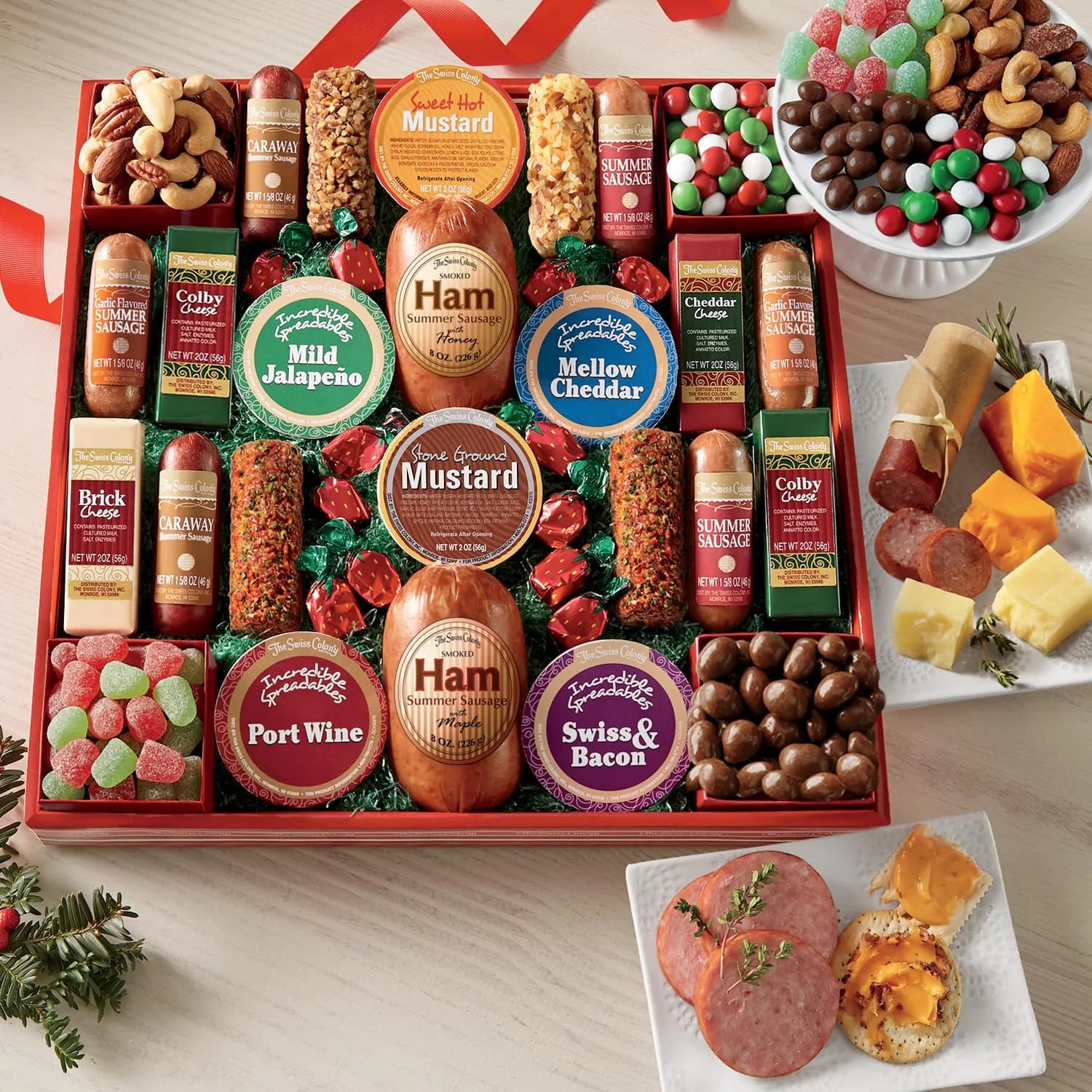 Assorted Holiday Treats with Ham Summer Sausages, Chocolates, Cheese Bars and Logs, and Candy Q434384